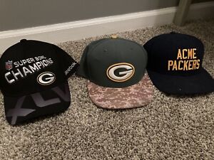 3 used green bay packers hats (2 New Era 7 1/8 & 1 Reebox Super Bowl Champions)