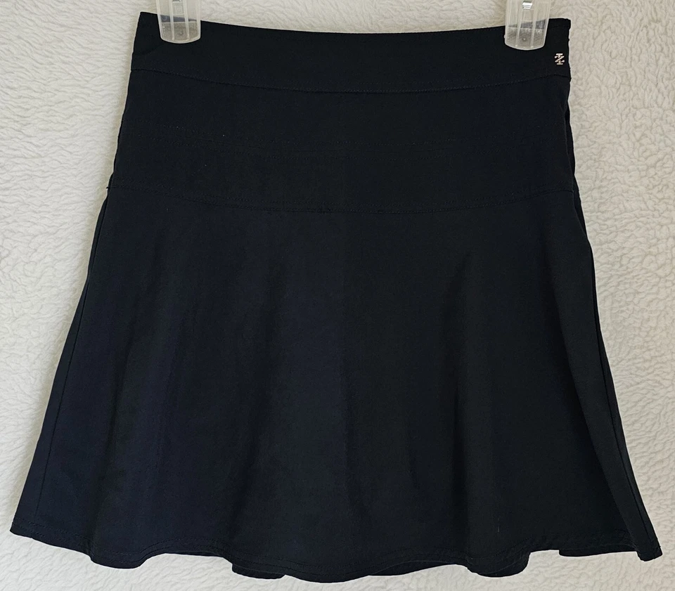 Falda corta Izod Golf para mujer talla 2 azul casi negra Foto 1 de 4