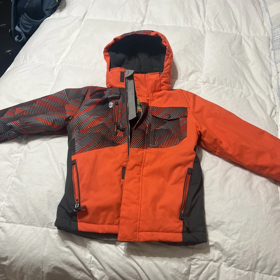 Chaqueta de campo Free para niños con capucha extraíble, nueva y sin usar talla juvenil pequeña Foto 1 de 4