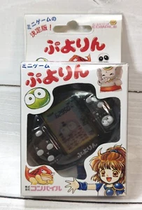 1997 Compile Puyo Puyo Handheld LCD Mini Game Black Puyo Pop - Bild 1 von 6