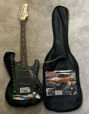 Guitarra Eléctrica Jeff Lutz Verde Media Luna Firmada y Personalizada con Estuche Foto 1 de 2