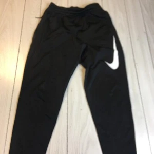 NIKE DRI-FIT WOMEN'S SIZE MEDIUM WARM UP PANTS- With Zip Pocket- 29”Inseam - Picture 1 of 11