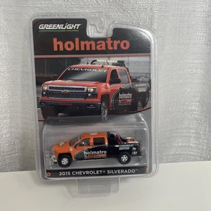 GREENLIGHT 1:64 2015 CHEVROLET SILVERADO CON EQUIPAGGIAMENTO - HOLMATRO 29851 - Foto 1 di 2
