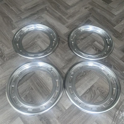 Triumph Herald, Spitfire Wheel Trims Set Of Four (slotted) lot of 4 new read - Image 1 of 4