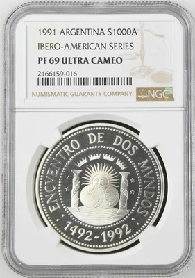 1991 ARGENTINA SILVER 1000 AUSTRALES IBERO PILLARS NGC PF 69 ULTRA CAMEO  - Image 1 of 2