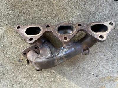Colector de escape delantero doble turbo 91-99 Mitsubishi 3000GT VR4 OEM  Foto 1 de 2