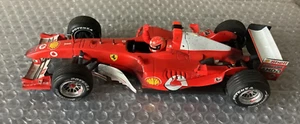 HotWheels Ferrari F2004 Sakhir/Bahrain 04/04/04 "dirty" Michael Schumacher B6222 - Bild 1 von 5