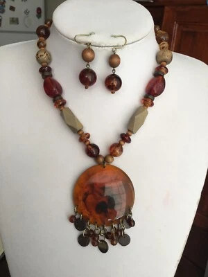 Multi brown lucite bead and wooden bead circle pendant necklace Earring Set - Image 1 of 3
