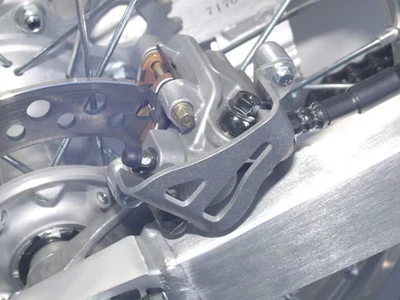 Works Connection - 25-012 - Aluminum Rear Brake Caliper Guard - Made In USA - image 1 of 4