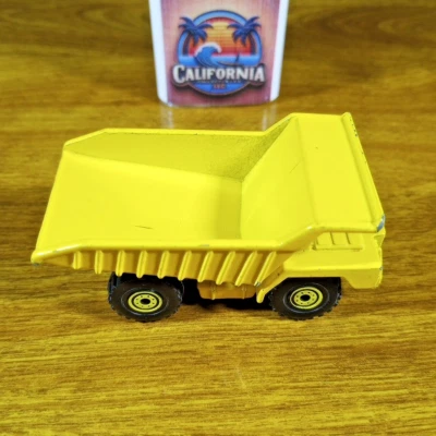 Hot Wheels Workhorses Blue Card CAT Dump Truck Yellow Malaysia 1989 Construction - Image 1 of 4
