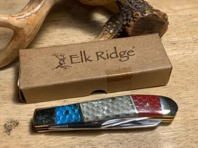 Navaja de bolsillo Elk Ridge roja, blanca y azul C-Tek Trapper 3 1/2" ER946 Foto 1 de 4