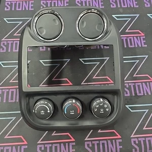 2010-2017 JEEP PATRIOT AC HEATER CONTROL SWITCH WITH RADIO BEZEL OEM ASSEMBLY - Picture 1 of 4