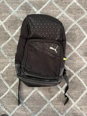 Bolso para libros Puma de segunda mano negro y verde neón Foto 1 de 4