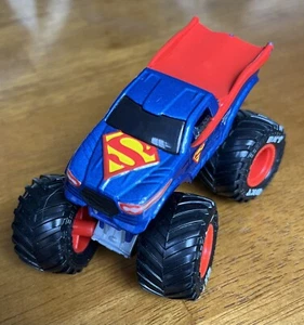 2022 FMS SML Monster Truck Man of Steel Superman w/ Cape Diecast Red Rims 1:64 - Picture 1 of 7