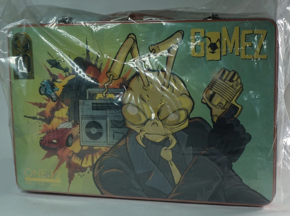 Mezco One:12 Agent Gomez the Roach with the Golden Head Toy Fair Exclusivo na caixa - Imagem 1 de 1