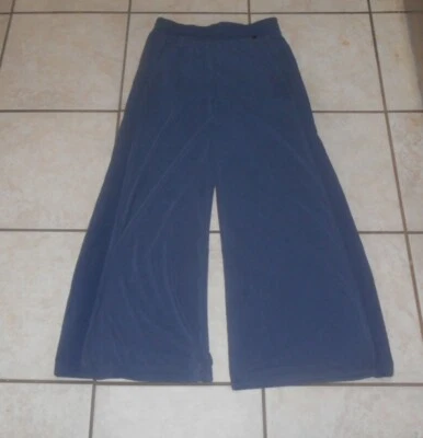 NUEVO CON ETIQUETAS PANTALONES UNDER ARMOUR "XS" MUJER AZUL CINTURA ELÁSTICA VOLUMEN IMPARABLE $100 Foto 1 de 4