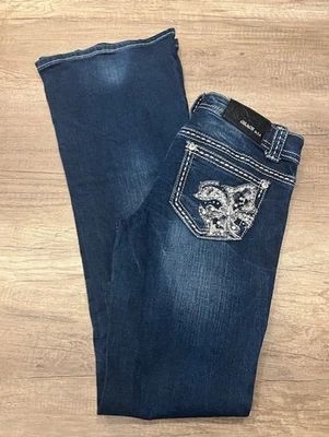 Pantalones de mezclilla elásticos Grace in LA de ajuste fácil acampanados oscuros con cuentas/secuencia para mujer talla 25 Foto 1 de 3