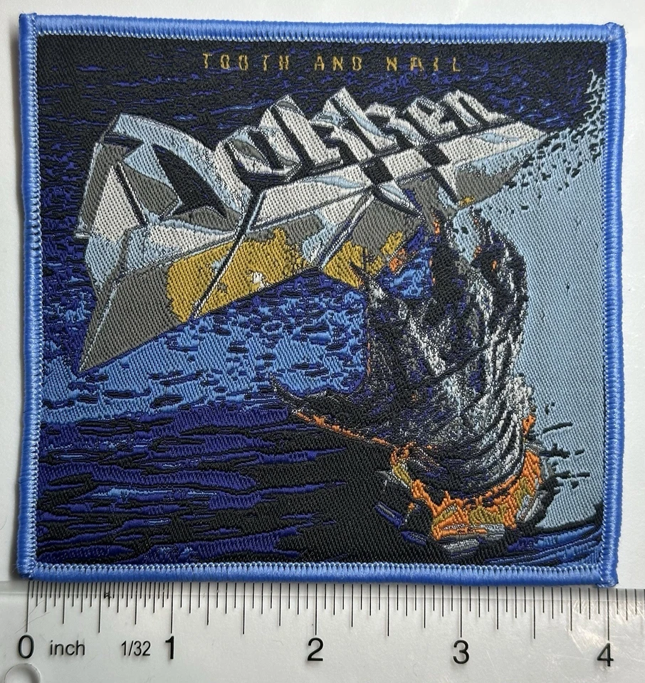 Parche tejido borde azul dientes y uñas Dokken Foto 1 de 1