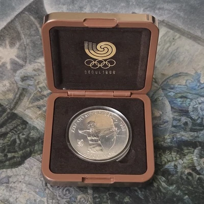 1988 SILVER SOUTH KOREA 10000 WON OLYMPIC PROOF ACHERY 1 OZ COIN WITH CERT. - Image 1 of 4