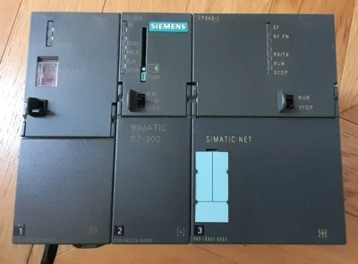 SIEMENS S7 300 - Lot - Alim PS 307 + CPU 314 + Carte de com. CP 343-1 - Photo 1/4