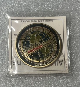 Moneda de desafío rara Raytheon Solipsys Zeus (avión pilotado a distancia) - Imagen 1 de 3