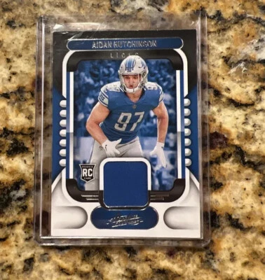 2022 Panini Absolute AIDAN HUTCHINSON Rookie Memorabilia RC #ARM-13 Lions - Image 1 of 2