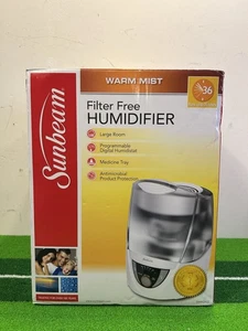 Sunbeam Warm Mist Humidifier, model SWM2422, designed to add moisture to the air - Picture 1 of 4