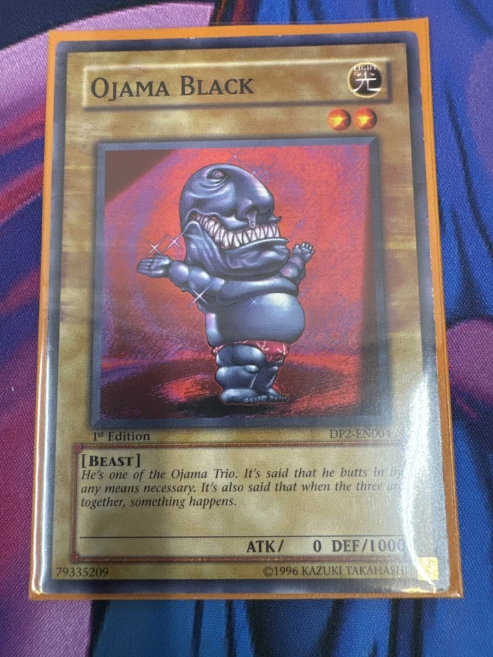 YuGiOh - Ojama Black - DP2-EN004- 1st Edition - LP MISPRINT Red ink smear error - Image 1 of 1