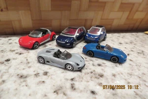 MPG : PORSCHE 918 & 911 roadster , SMART Roadster , Fortwo & Forfour - Foto 1 di 6