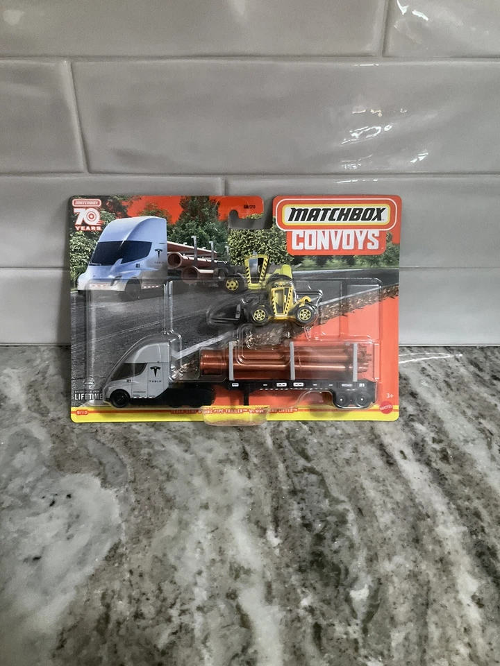 Matchbox Convoy Tesla Semi and Pipe Trailer with Load Lifter Fork Lift - Image 1 of 1