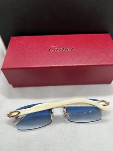 Cartier buffalo horn glasses - plain white buffalo with gold / blue lenses