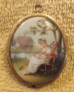 Vintage Brooch with Woman in Rocker Reading a Book Gold Tone Frame with pin back - Picture 1 of 3