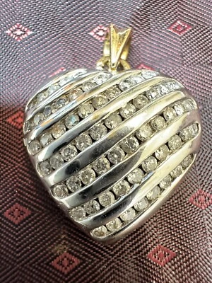 14CT GOLD HEART DIAMOND PENDANT 1.0CT TOTAL. 5.2GRAMS - Image 1 of 4