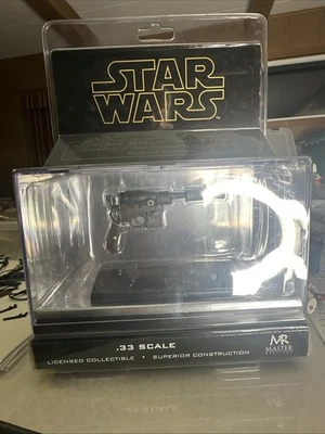 Réplicas maestras réplica a escala .33 Han Solo Blaster Empire Strikes Back 2006 Foto 1 de 3