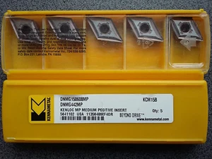 ¡VENTA! 5 x PLACAS DE CORTE REVERSIBLES KENNAMETAL DNMG 150608MP KCM15B - Imagen 1 de 1
