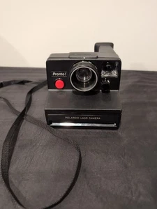 Polaroid Pronto! Cámara terrestre de película instantánea negra con correa ajustable - Imagen 1 de 3