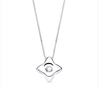 Collar oro 18k 750 mls. Oro Blanco. Estrella 5,5 MM. Con Diamante 0,02 Q.  - Imagen 1 de 4