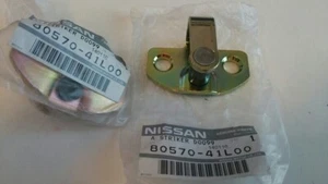 NISSAN 240SX S13 89-94 Genuine Front Door Lock Striker RH LH 80570-41L00 x2 OEM - Bild 1 von 1