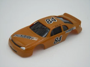 JOHNNY LIGHTNING #822 GOLDEN BROWN #84 90'S STOCK CAR SHELL  NOS FITS AURORA AFX - Picture 1 of 6