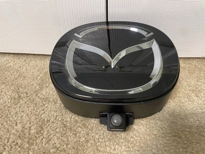 Mazda CX-9 CX9 2021-2023 emblema de parrilla delantera con cámara base OEM TK79-51730 Foto 1 de 4