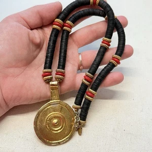 Vintage Signed CADORO Ethnic Gold Plated Medallion Red Glass Bead Black Necklace - Picture 1 of 7