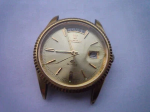 Goldene Vintage Herrenarmbanduhr Ricoh Quartz Day & Date - Bild 1 von 24
