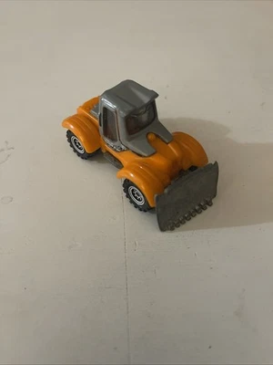 Литой игрушечный автомобиль трактор плуг бульдозер спичечный коробок оранжевый серый #9 - Изображение 1 из 2