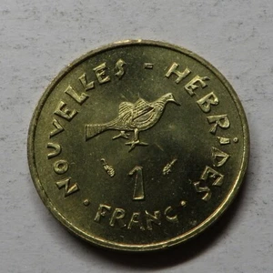 Nowy frank hebrydowy 1975(a) niklowo-mosiężny KM # 4.2 UNC - Zdjęcie 1 z 2