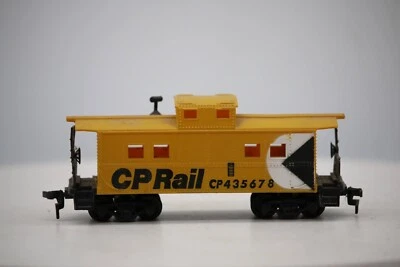 HO Scale CP Rail CP435678 Yellow Caboose w/ Smoke stack. - Image 1 of 4
