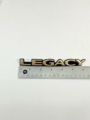 1995-1999 Subaru Legacy Outback AWD Emblem Logo Letters Badge Trunk End Gate OEM - Image 1 of 4