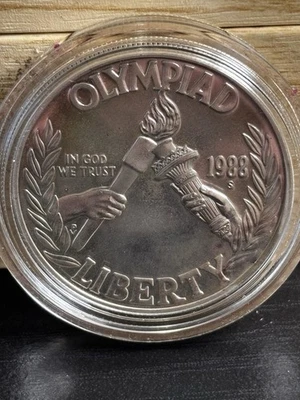 1988-S Olympic Liberty Commemorative Silver Dollar. Proof In Capsule 90% Silver - Image 1 of 4