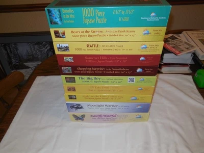 Lot of 10 Sunsout 1000 piece puzzles. - Image 1 of 4