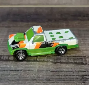 1993 MATCHBOX SPARKERS WHITE & GREEN DODGE DAKOTA REV'EM UP & WATCH SPARKS FLY - Picture 1 of 9