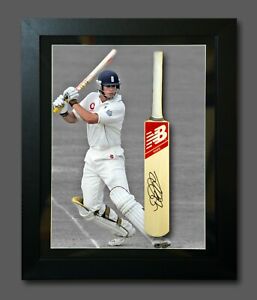 Alastair Cook Signed Mini Cricket Bat In A Frame Presentation. Sport Memorabilia